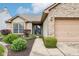 Charming brick home features a two-car garage, manicured lawn, and a welcoming entrance at 778 Kingston Cir, Brownsburg, IN 46112