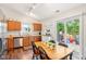 Bright kitchen featuring wooden cabinets, stainless steel appliances, and a sliding door to the patio at 778 Kingston Cir, Brownsburg, IN 46112