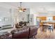 Open concept living room with hardwood floors connecting to the kitchen and entry way at 778 Kingston Cir, Brownsburg, IN 46112