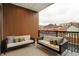 Cozy balcony featuring comfortable seating with views of the neighborhood at 527 E North St, Indianapolis, IN 46204