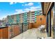 Condo balcony with outdoor seating and a view of the city skyline at 527 E North St, Indianapolis, IN 46204