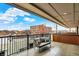 Relaxing balcony with outdoor seating and a stunning city view, perfect for enjoying the outdoors at 527 E North St, Indianapolis, IN 46204
