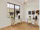 Bright office space with large windows, light wood floors, and modern decor at 527 E North St, Indianapolis, IN 46204