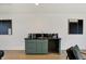 A beautifully styled wet bar features modern appliances and a sleek design at 531 E North St, Indianapolis, IN 46204