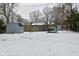 Snowy backyard with shed and playset at 306 W Janet Dr, Brownsburg, IN 46112