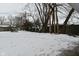 Snowy backyard with shed and playset at 306 W Janet Dr, Brownsburg, IN 46112