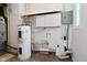 Full view of the home's furnace, water heater, and plumbing at 306 W Janet Dr, Brownsburg, IN 46112