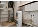Full view of the home's furnace, water heater, and plumbing at 306 W Janet Dr, Brownsburg, IN 46112