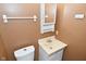 Simple bathroom with pedestal sink and toilet at 306 W Janet Dr, Brownsburg, IN 46112