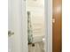 Clean bathroom with shower/tub combo and gray floor at 306 W Janet Dr, Brownsburg, IN 46112
