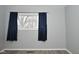 Spacious bedroom with dark blue curtains and vinyl flooring at 306 W Janet Dr, Brownsburg, IN 46112
