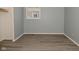 Spacious bedroom with gray walls and wood-look floors at 306 W Janet Dr, Brownsburg, IN 46112