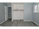 Bright bedroom with double closet and gray walls at 306 W Janet Dr, Brownsburg, IN 46112