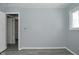 Empty bedroom with gray walls and wood-look floors at 306 W Janet Dr, Brownsburg, IN 46112