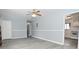 Dining room with hardwood floors and view of kitchen at 306 W Janet Dr, Brownsburg, IN 46112