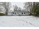 Rear view of the house in winter at 306 W Janet Dr, Brownsburg, IN 46112