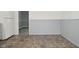 Kitchen with gray cabinets and speckled floor at 306 W Janet Dr, Brownsburg, IN 46112