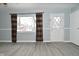 Bright living room featuring hardwood floors and updated paint at 306 W Janet Dr, Brownsburg, IN 46112