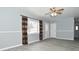Living room with hardwood floors, gray walls and windows at 306 W Janet Dr, Brownsburg, IN 46112