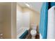 Simple bathroom with shower/tub and wood-look flooring at 1320 Pearl St, Columbus, IN 47201