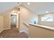 Upper hallway with carpet, leading to bedrooms at 1320 Pearl St, Columbus, IN 47201