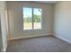 Cozy bedroom with soft carpet, large windows offering natural light, and neutral color scheme at 379 S Cherry St, Westfield, IN 46074
