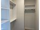Walk-in closet with built-in shelving and rods, ready for organized storage at 379 S Cherry St, Westfield, IN 46074