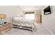 Cozy bedroom featuring a bed, bedside tables, carpeted floors, and neutral walls at 19140 Golden Meadow Way, Noblesville, IN 46060