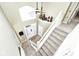 Bright foyer featuring high ceilings, large window, white staircase, and neutral color palette at 19140 Golden Meadow Way, Noblesville, IN 46060