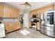 Modern kitchen with stainless steel appliances, light cabinets, and granite countertops at 19140 Golden Meadow Way, Noblesville, IN 46060