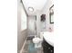 This tidy bathroom features a shower, vanity, and storage for convenient organization at 605 Brentwood E Dr, Plainfield, IN 46168