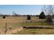 Picturesque rural landscape with fields and trees, showing off the property's natural surroundings at 13205 E Legal Tender Rd, Columbus, IN 47203