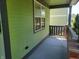 Front porch with brick pillars and a view of the street at 2133 N Park Ave, Indianapolis, IN 46202