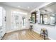 Kitchen with French doors opening to a backyard patio at 10561 Sand Creek Blvd, Fishers, IN 46037