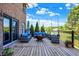 Cozy backyard deck with comfortable seating and elegant string lights overhead at 13208 State Road 32 E, Noblesville, IN 46060