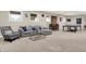 Finished basement area with comfortable seating and ping pong table at 13208 State Road 32 E, Noblesville, IN 46060