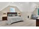 Charming bedroom with natural light, neutral colors, and comfortable furnishings at 13208 State Road 32 E, Noblesville, IN 46060