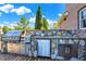 Outdoor kitchen with stone accents and built-in stainless steel appliances at 13208 State Road 32 E, Noblesville, IN 46060