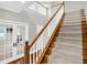 Staircase with carpet and white railing at 13208 State Road 32 E, Noblesville, IN 46060