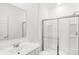 Bathroom featuring vanity, mirror and shower stall at 573 Carroll St, New Whiteland, IN 46184