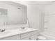 Spacious bathroom with double sinks, a bathtub, and a shower at 573 Carroll St, New Whiteland, IN 46184