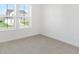 Bright bedroom with large windows and neutral carpeting at 573 Carroll St, New Whiteland, IN 46184