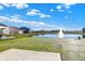 Community pond with fountain, provides scenic views at 573 Carroll St, New Whiteland, IN 46184