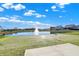 Community pond with fountain, provides scenic views at 573 Carroll St, New Whiteland, IN 46184