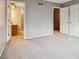 Spacious bedroom with carpet and en-suite bathroom at 2011 Oldfields Cir S Dr, Indianapolis, IN 46228