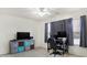 Versatile bedroom with a TV, desk setup, and neutral decor; suitable for an office at 1560 Cold Spring Dr, Brownsburg, IN 46112