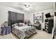 Cozy bedroom featuring a ceiling fan, decorated walls, and comfortable furnishings at 1560 Cold Spring Dr, Brownsburg, IN 46112
