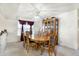 Elegant dining room featuring a wooden table, ornate chairs, and a classic china cabinet, perfect for Gathering meals at 1560 Cold Spring Dr, Brownsburg, IN 46112