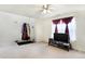 Bright living room with a large window, TV, and minimalist decor, providing a comfortable and functional space at 1560 Cold Spring Dr, Brownsburg, IN 46112