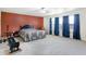 Spacious main bedroom with a large window, a bed and workout equipment at 1560 Cold Spring Dr, Brownsburg, IN 46112